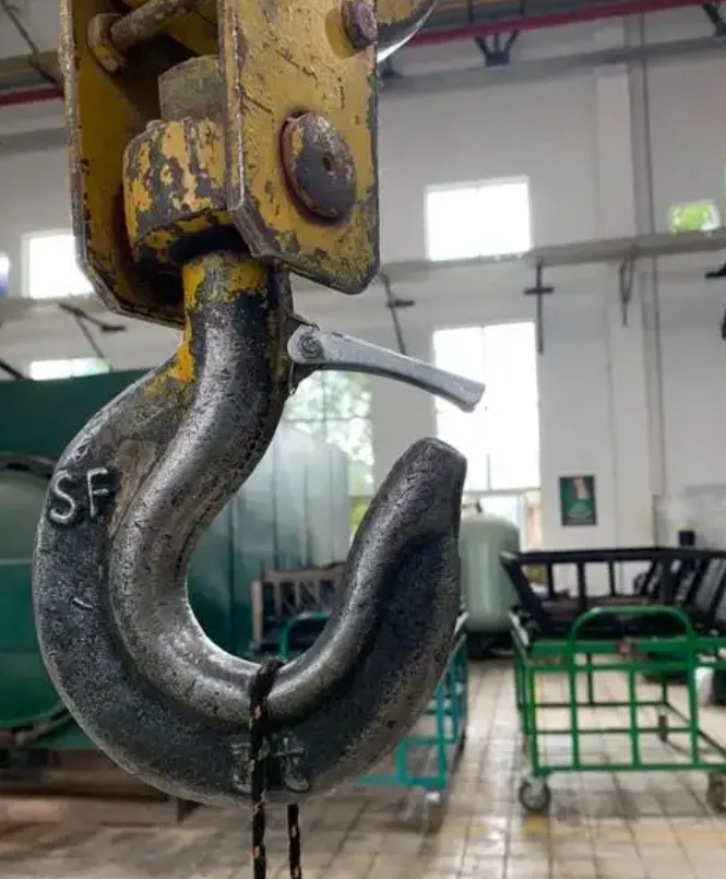Crane hook with severe saddle wear and safety latch inspection