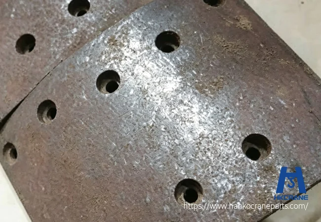 Overhead-crane-problems-showing-a-worn-hoist-brake-lining-requiring-replacement
