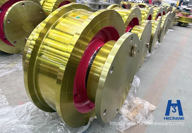 Crane parts supplier China: forged crane wheel with machined tread, double flange, and bore, finished and ready for export