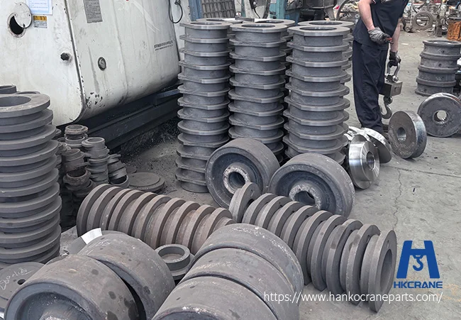 Forged-wheel-blanks-awaiting-heat-treatment-in-the-crane-parts-workshop