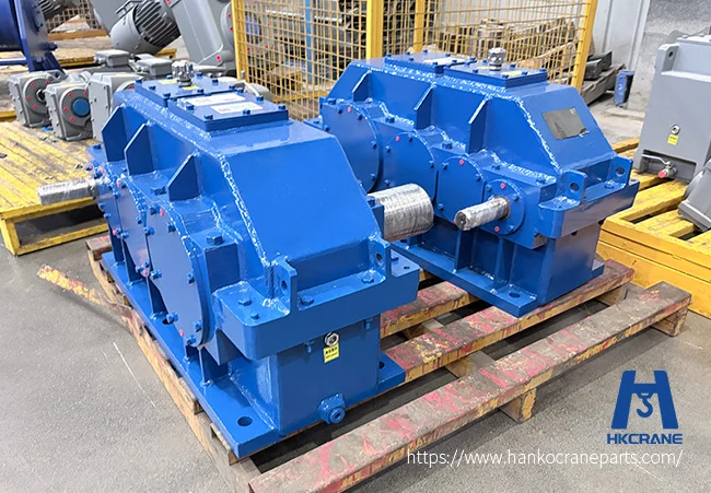 A crane gearbox on the shop floor, where bearing failure starts with lubrication and mounting faults