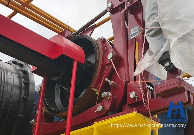 Crane shoe brake assembly with friction lining and brake drum for hoist stopping system