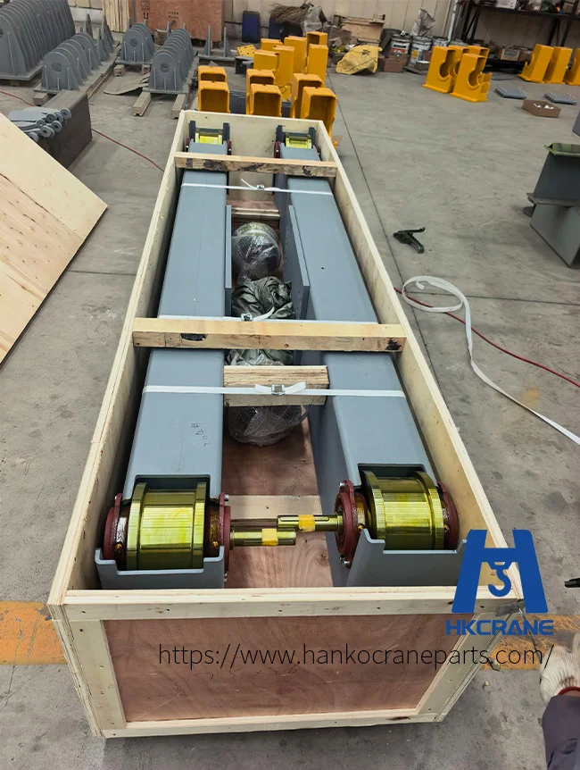 European-crane-end-beams-with-wheel-assemblies-packed-in-a-wooden-crate