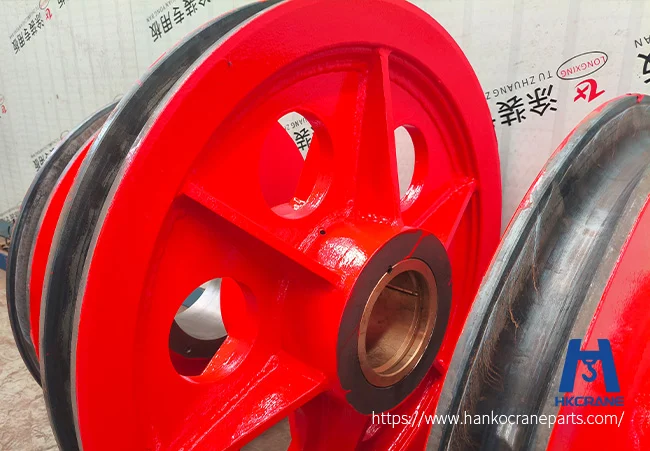 Painted custom crane sheaves with copper bushings ready for an Indonesian shipyard order