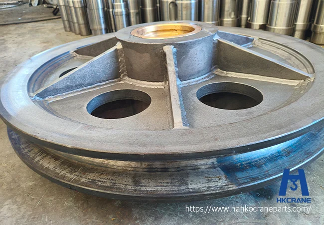Raw machined steel crane sheave with welded web reinforcement before coating